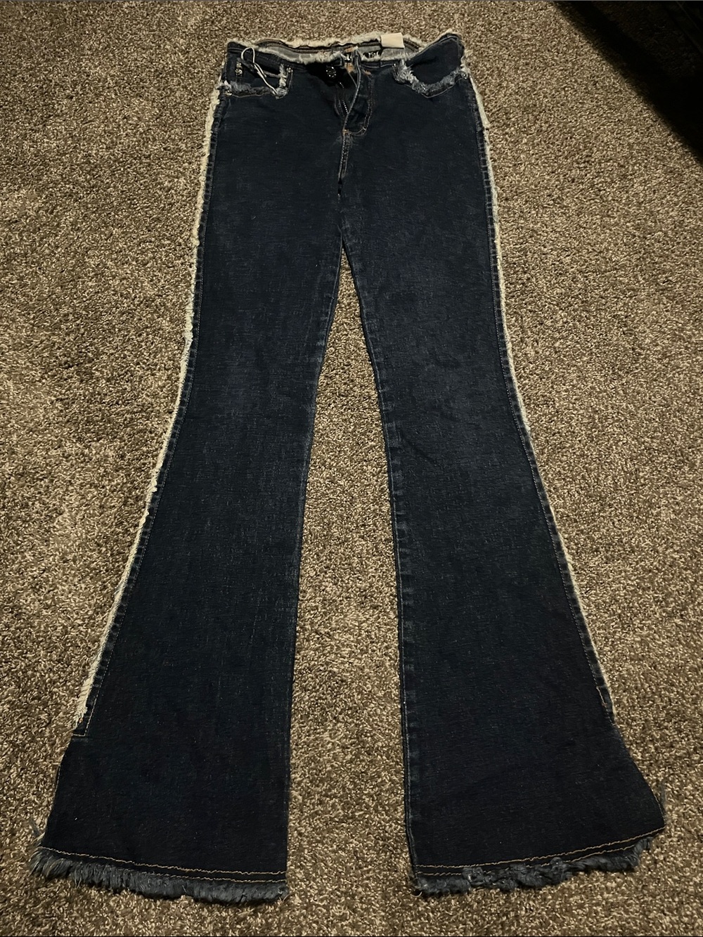 Mid-Rise Dark Blue Flare Jeans with Frayed Side Seam